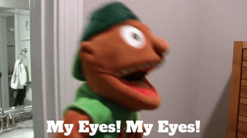 A Puppet Says " My Eyes My Eyes " While Wearing A Green Hat GIF