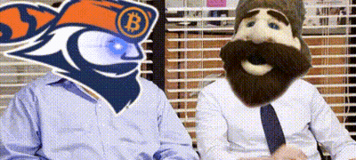 A Puppet With A Beard And A Hat Is Sitting Next To Another Puppet With A Beard . GIF