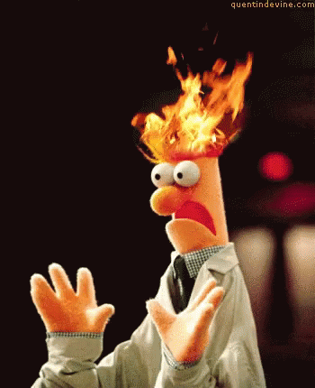 A Puppet With Flames Coming Out Of His Head And The Website Quantindevine.com GIF