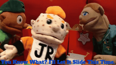 A Puppet With Jr On His Shirt Talks To Another Puppet GIF