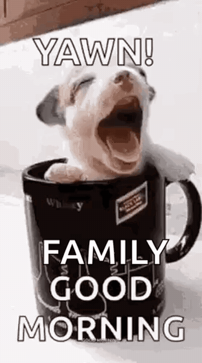 A Puppy Is Yawning In A Coffee Mug With A Good Morning Message . GIF