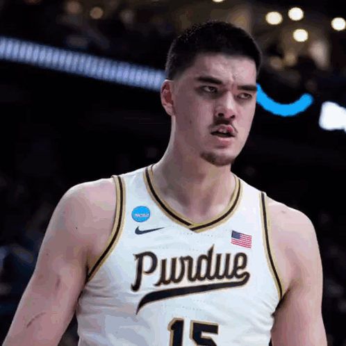 A Purdue Basketball Player Wearing Number 15 Stands On The Court GIF