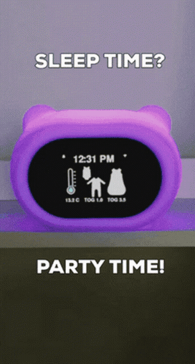 A Purple Alarm Clock Shows The Time As 12:31 Pm GIF