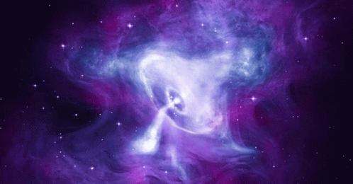 A Purple And Blue Galaxy With A Few Stars GIF