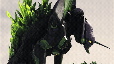 A Purple And Green Monster With A Sword In Its Hand GIF