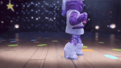 A Purple And White Cartoon Character Is Dancing On A Stage GIF