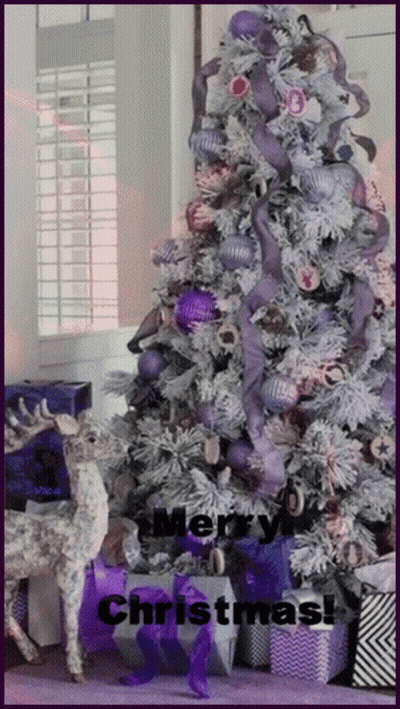 A Purple And White Christmas Tree With The Words Merry Christmas On It GIF