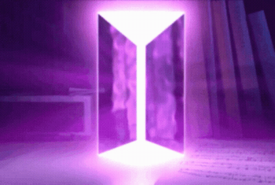 A Purple Background With A White Glowing Triangle In The Middle GIF