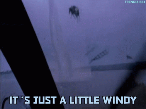 A Purple Background With The Words " It 'S Just A Little Windy " On It GIF