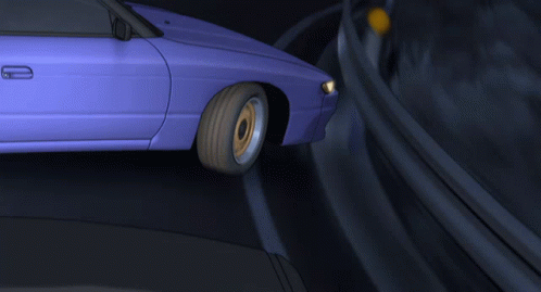 A Purple Car Is Driving Down A Road With A Yellow Tire GIF