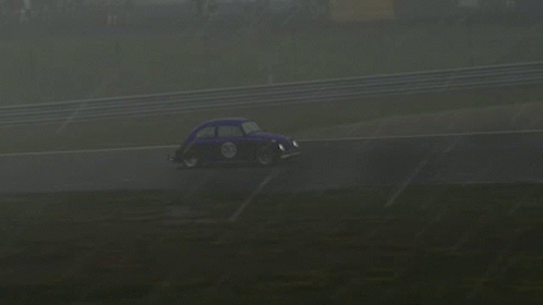 A Purple Car That Has The Number 50 On It GIF