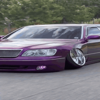 A Purple Car With A Sticker On The Windshield That Says " Always " GIF