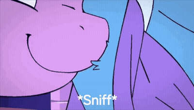A Purple Cartoon Character Is Sniffing Something GIF