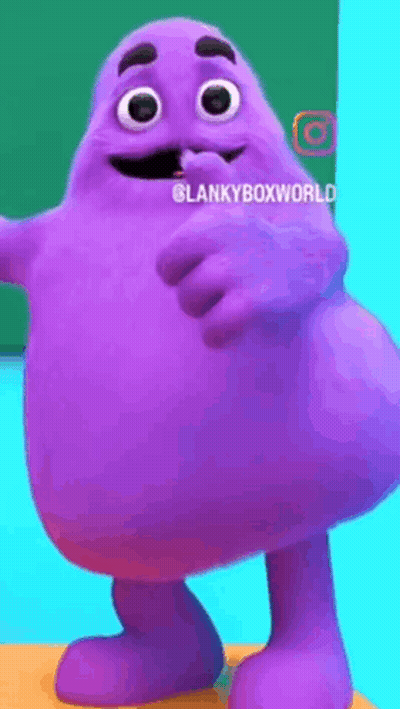 A Purple Cartoon Character With A Mustache Is Standing On A Table . GIF