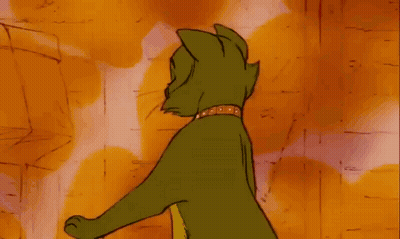 A Purple Cat With A Gold Collar Is Standing On Its Hind Legs In Front Of A Yellow Background . GIF