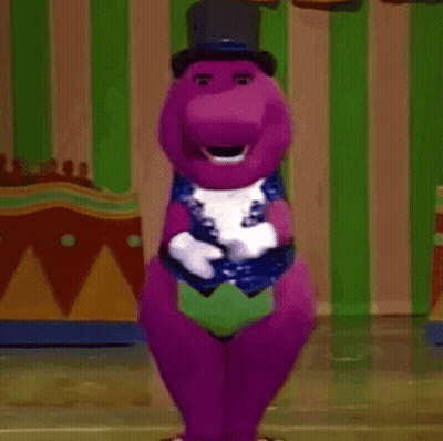 A Purple Dinosaur Is Wearing A Top Hat And Gloves And Dancing . GIF