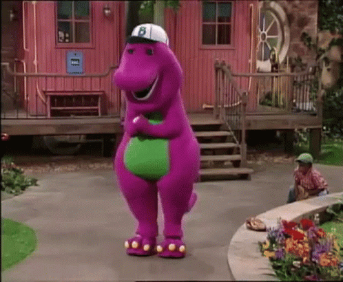 A Purple Dinosaur Wearing A Baseball Cap And Slippers Is Dancing In Front Of A Pink House . GIF