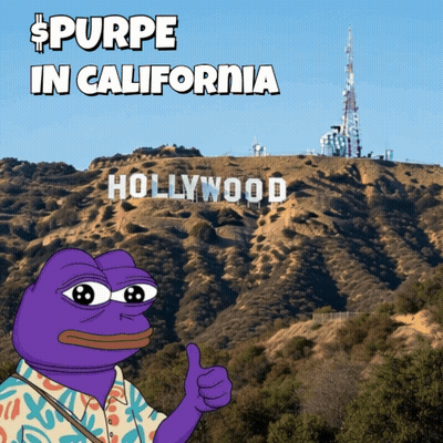 A Purple Frog Is Giving A Thumbs Up In Front Of Hollywood GIF