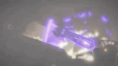 A Purple Light Is Shining On A Dark Background . GIF