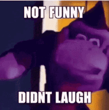 A Purple Monkey With The Words `` Not Funny Didnt Laugh '' Written On It GIF