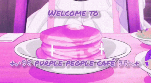 A Purple Pancake Is On A Plate With The Words Welcome To Purple People Cafe Below It GIF