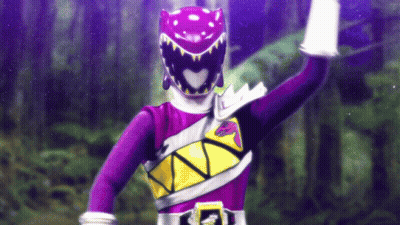 A Purple Power Ranger With A Black Helmet And A Yellow Belt . GIF