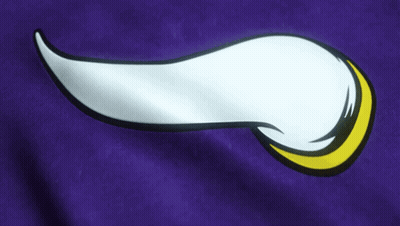 A Purple Shirt With A White And Yellow Feather On It GIF