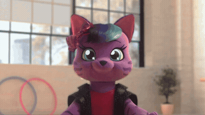 A Purple Stuffed Animal With A Flower In Its Hair GIF