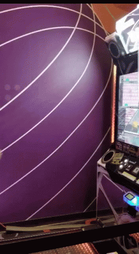 A Purple Wall With White Lines On It Is Behind A Video Game GIF