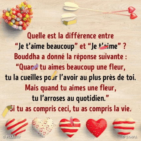 A Quote In French With Hearts And Lollipops On A Wooden Table GIF