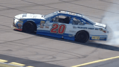 A Race Car Has The Number 20 On The Side GIF