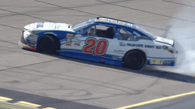 A Race Car Has The Number 20 On The Side GIF