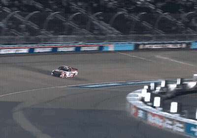 A Race Car Is Going Around A Curve On A Track With A Sign That Says ' Busch ' On It GIF