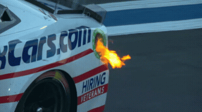 A Race Car With A Flame Coming Out Of The Exhaust Pipe That Says Hiring Veterans GIF