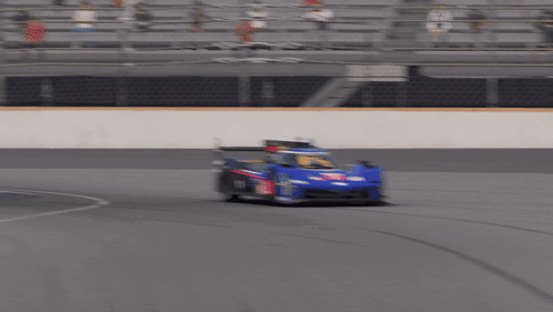A Race Car With The Number 1 On The Side Of It GIF