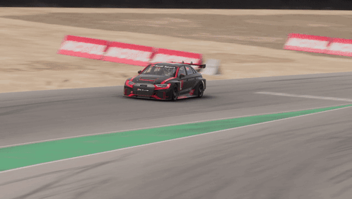 A Race Car With The Number 1 On The Side Of It GIF
