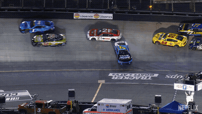 A Race Car With The Number 21 On The Side GIF