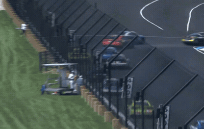 A Race Car With The Number 22 On The Side GIF