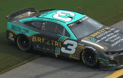 A Race Car With The Number 3 On The Side Of It GIF
