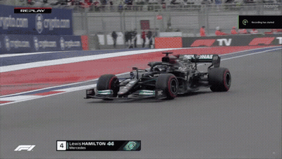 A Race Car With The Number 44 On The Front GIF