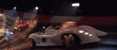 A Race Car With The Number 5 On It GIF