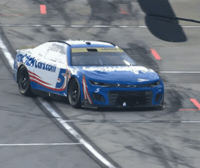A Race Car With The Number 5 On The Front GIF