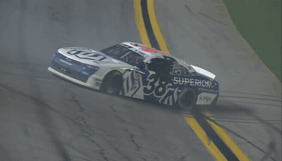A Race Car With The Number 53 On The Side Of It GIF