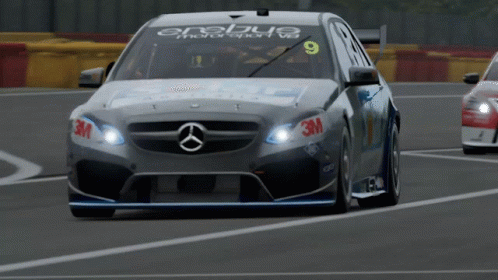 A Race Car With The Number 9 On The Side GIF