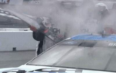 A Race Car With The Word High Point Written On The Side GIF
