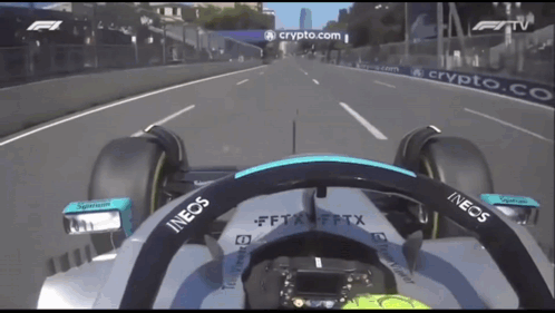 A Race Car With The Word Ineos On It GIF