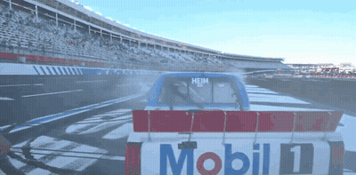 A Race Car With The Word Mobil On The Back GIF