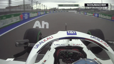 A Race Car With Uralkali Written On The Side Of It GIF