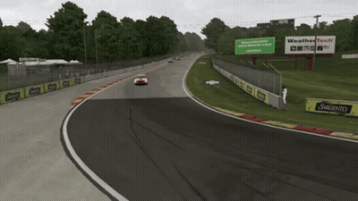 A Race Track With A Sign That Says Weather Tech GIF