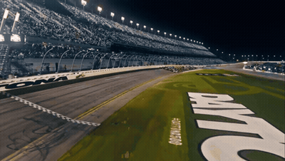 A Race Track With The Word Daytona On The Side GIF